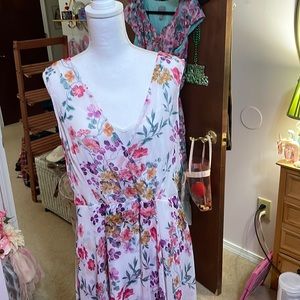 Calvin Klein size 14 white with multiple colored flowers dress.